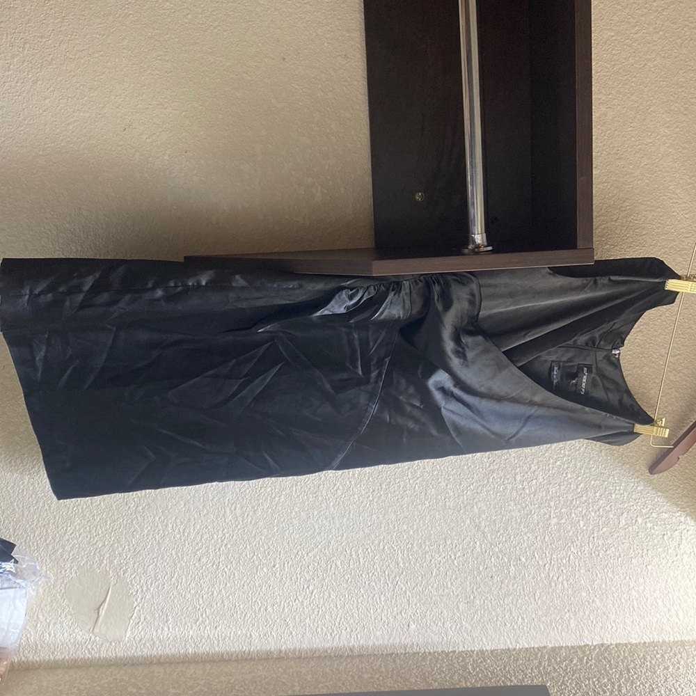 Cute sexy little black dress with detachable lining that has adjustable strap